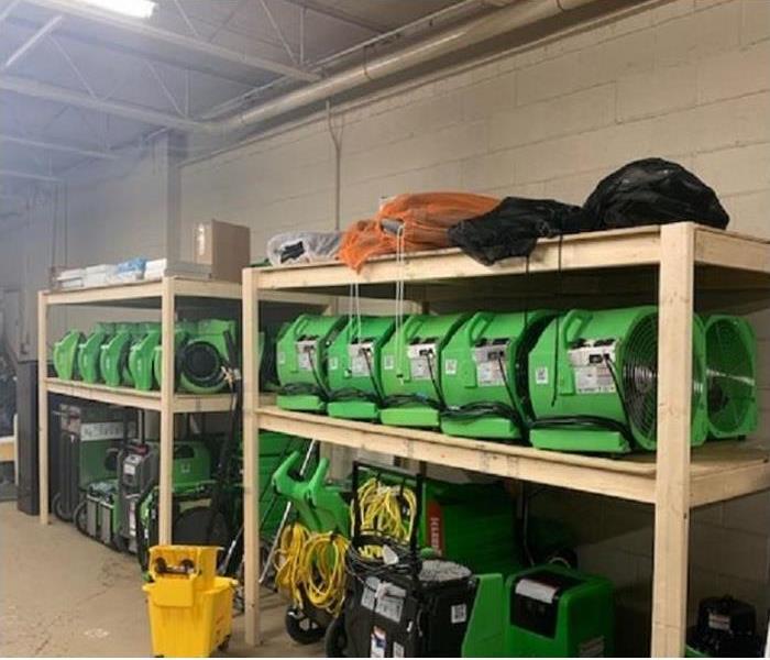 SERVPRO equipment stacked inside of storage facility